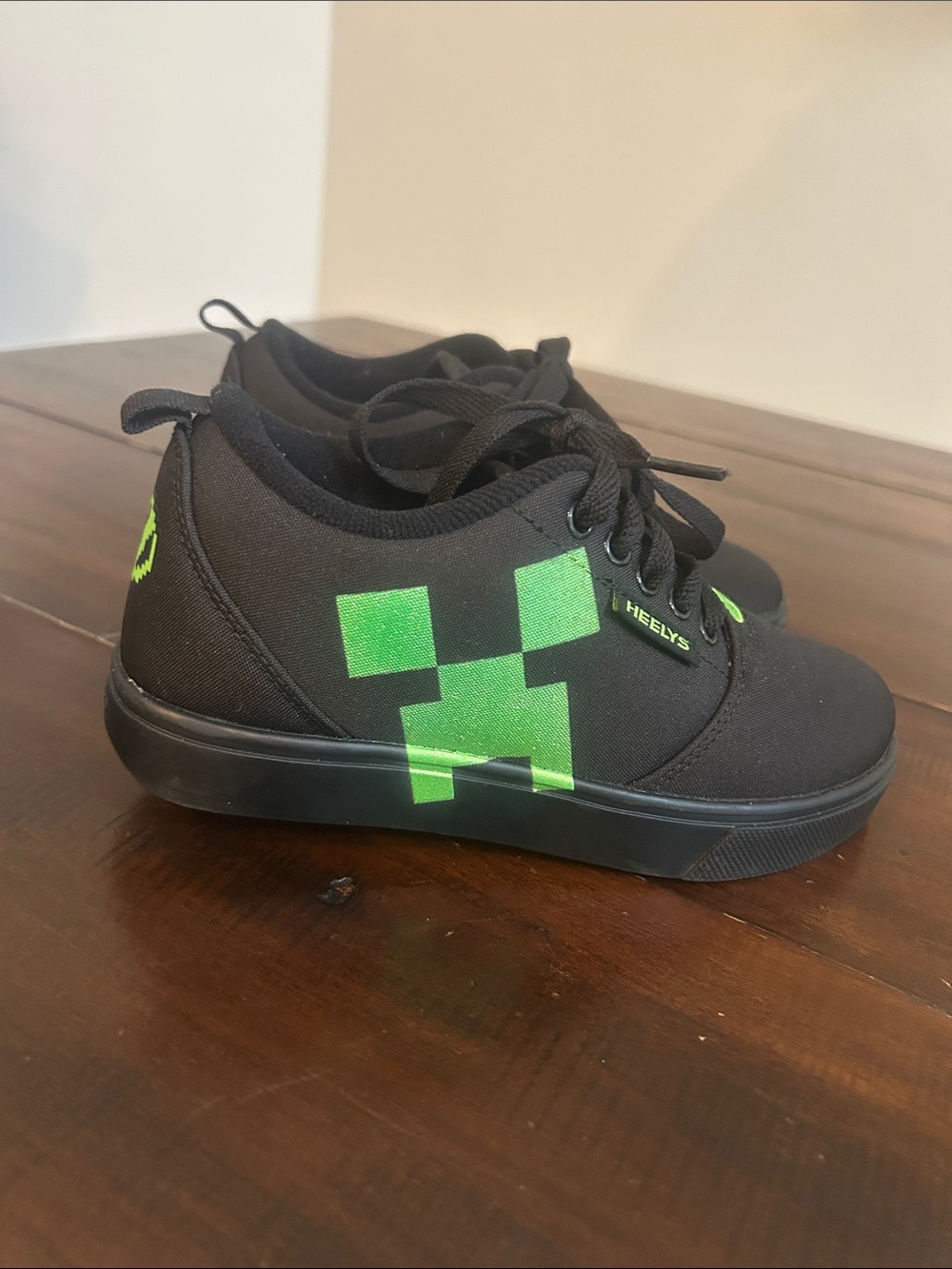 Heelys Kids Black Sneakers with Bright Green Pixel Graphic